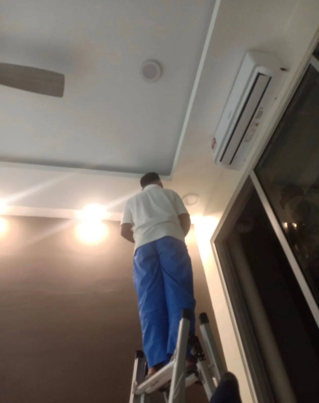 Ceiling light installation in progress